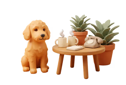 A table with two mugs, a blank notepad, and an old-style phone, with a golden puppy sitting beside it.